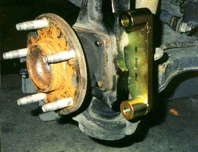 Spindle With Caliper Bracket Attached