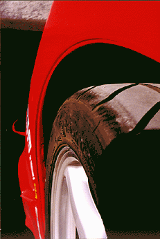 Modified wheel wells from the side view.